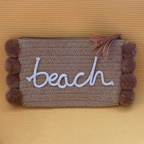 magnolia charms Handbags - Beach Days Pom Pom Oversized Straw Clutch, Natural zipper closure 
10” x 7”